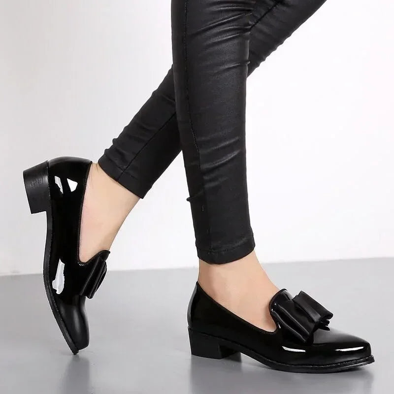 Veloria | Patent leather loafers with buckle detail